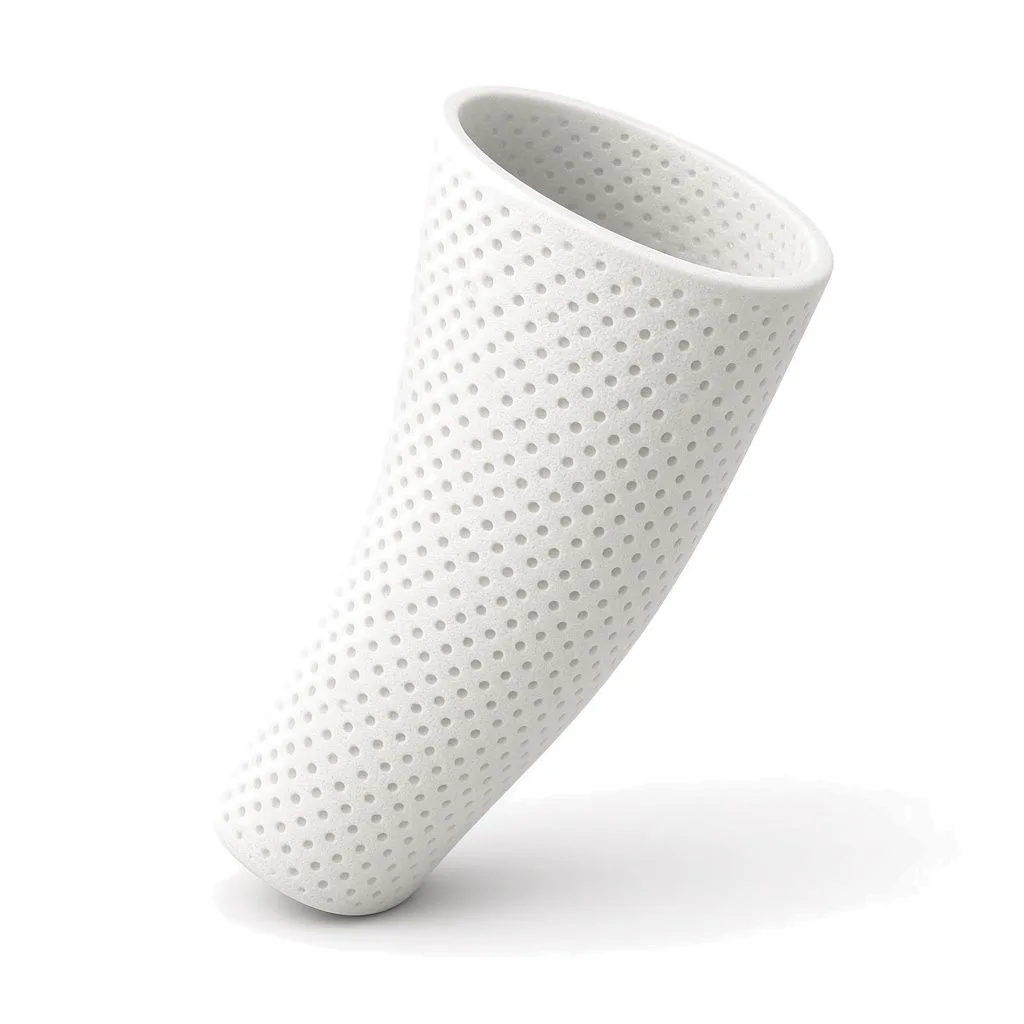 White MJF-printed flexible prosthetic liner sleeve in Lubrizol ESTANE 3D TPU M95A