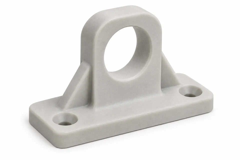 Illustrative white nylon mounting bracket with ribs and fastener holes